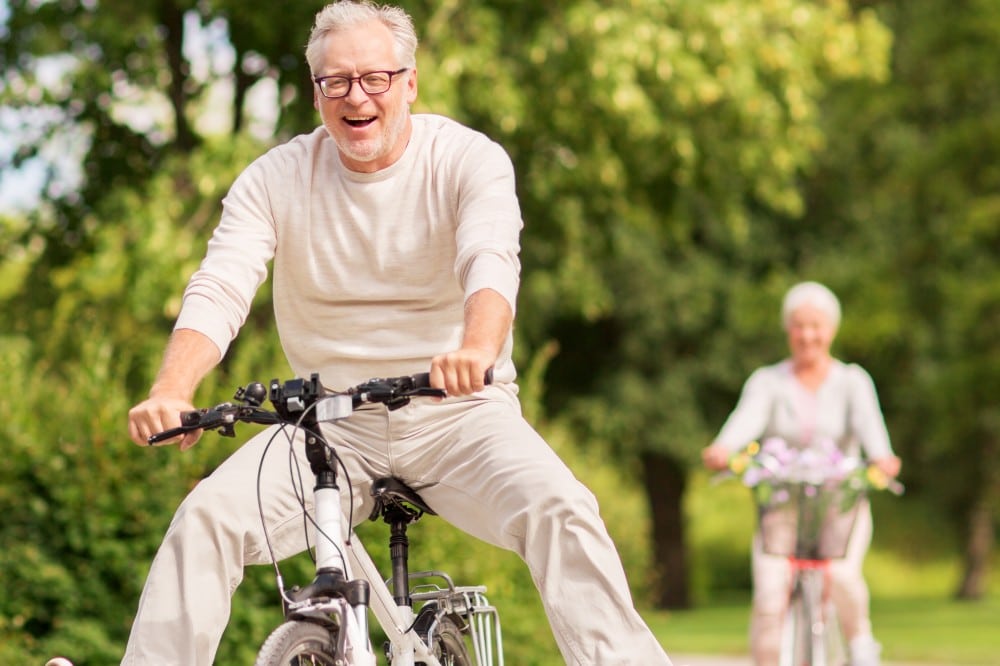 senior riding a bike