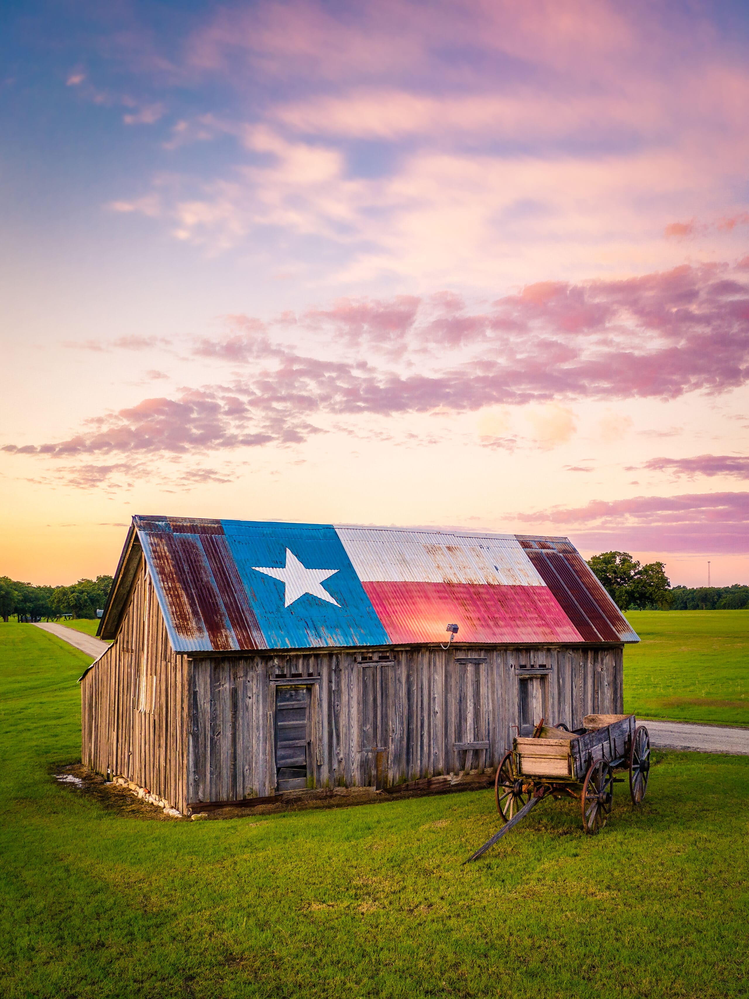 old barn painted with a texas flag