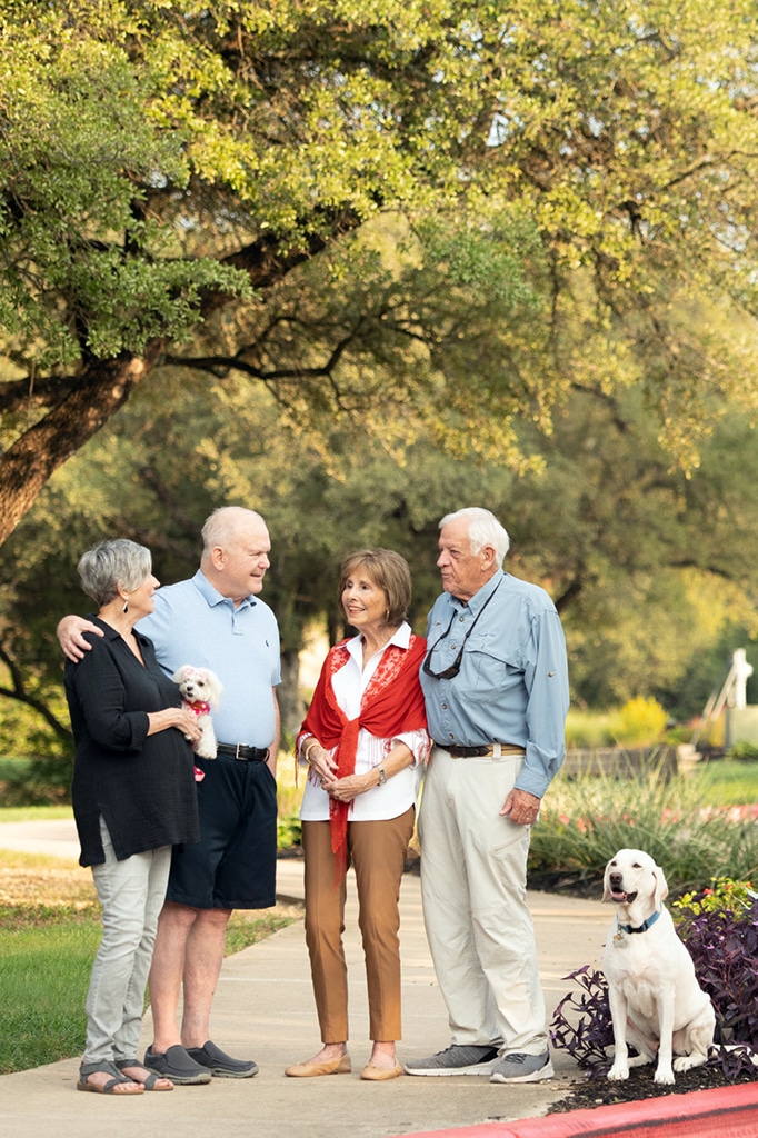 senior couples walking their pets