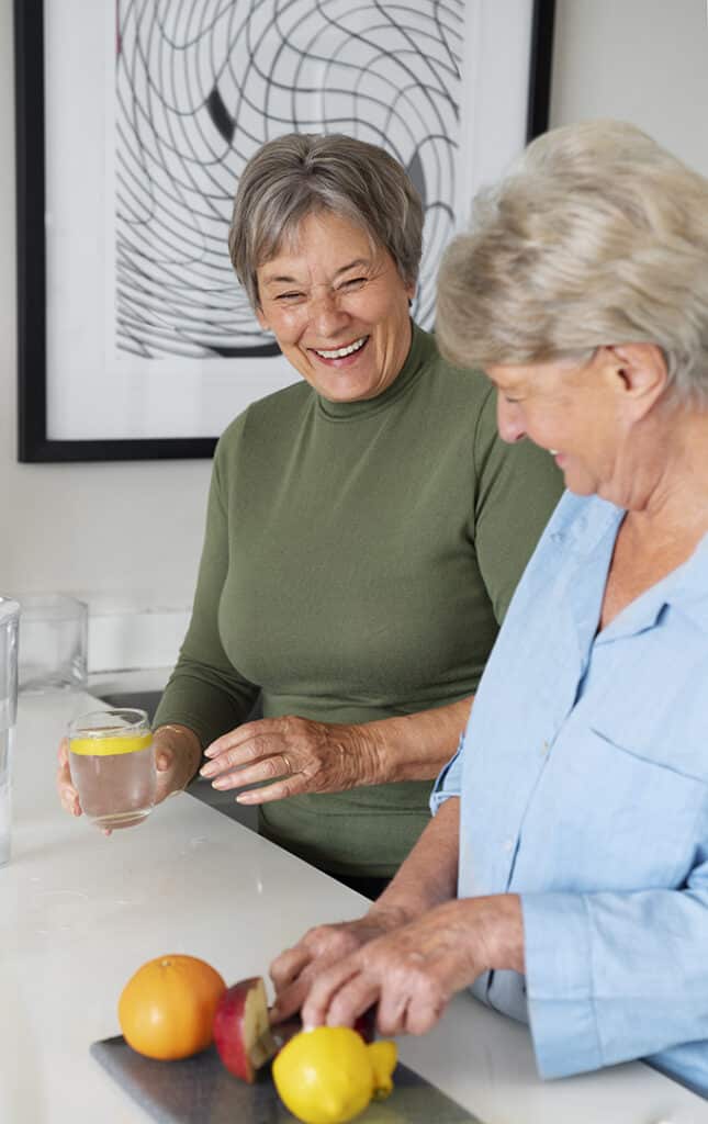 senior residents preparing a meal in their kitchen