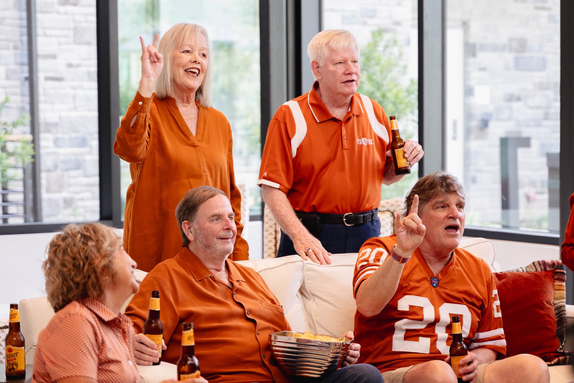 group of seniors celebrating their favorite sports team