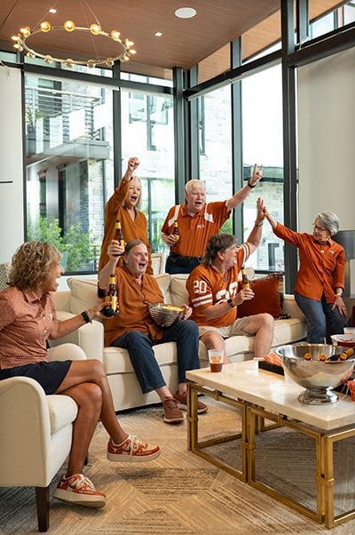sports fans cheering for their favorite team.