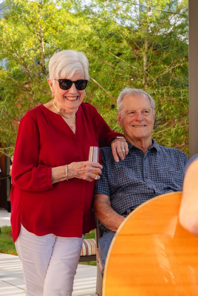 senior couple sit and enjoy the live music at LHV