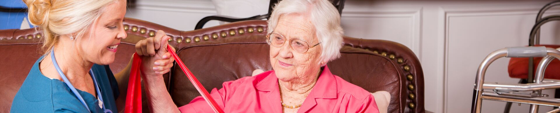 senior woman participating in senior rebab