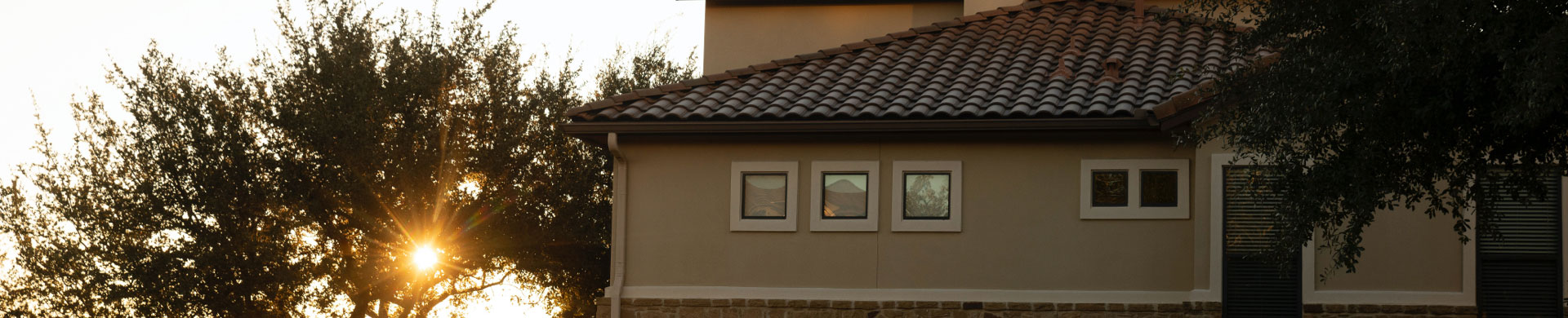 extended view of senior living apartment and sunset
